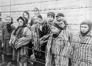 Jewish twins kept alive to be used in Mengele's medical experiments. These children were liberated from Auschwitz by the Red Army in January 1945. (Source:Wikipedia)