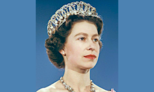 Official portrait of Queen Elizabeth II before the start of her 1959 tour of the U.S. and Canada as Queen of Canada. She wears a pink dress with the Vladimir Tiara, the Queen Victoria Jubilee Necklace, the blue Garter Riband, Badge and Garter Star and the Royal Family Orders of King George V and King George VI- Wikipedia