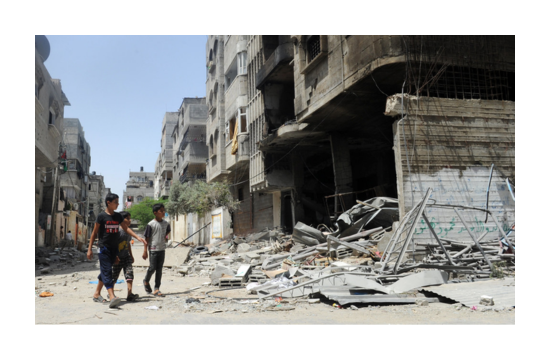 Gaza Residents Inspect Remains After Israeli Air Strikes | Flickr
