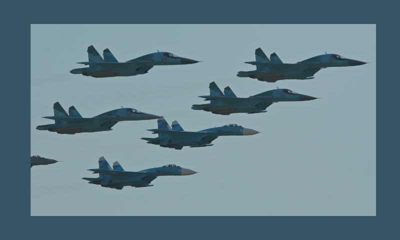 The next installment began with a ten-ship formation of aircraft from Lipetsk based 4.GTsPAV i VI. In this shot of part of the formation are:- Four Su-34 Fullbacks:- '02 red / RF-92251', '03 red', '04 red / RF-92252', '09 red' and two Su-27SM Flankers:- '04 red / RF-92211' c/n 36911018513, '06 red / RF-92210' c/n 36911018618. Russian Air Force 100th Anniversary Airshow. Zhukovsky, Russia.-wikipedia