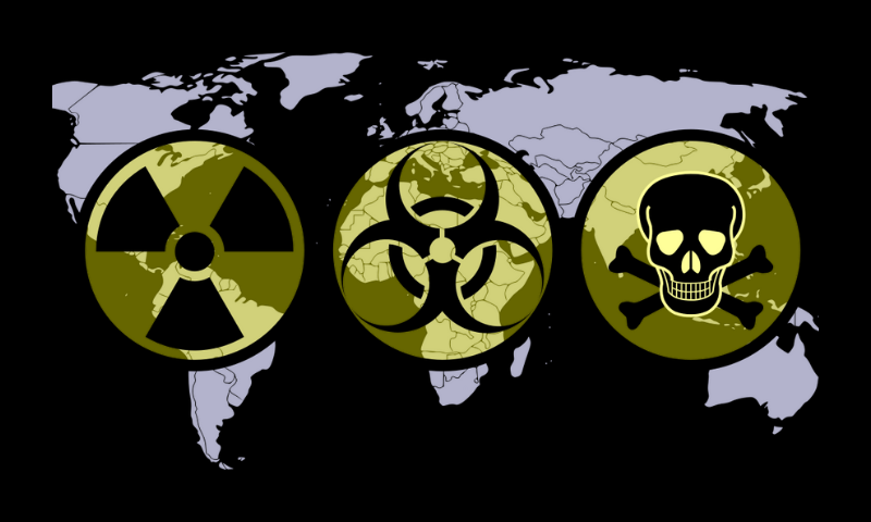 World map with WMD hazard symbols superimposed on it.-wikipedia