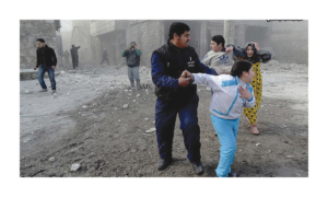 Syrian family members run in the street following an attac… | Flickr
