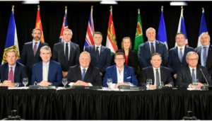 Canadian premiers pose for a group photograph during a meeting of the Council of the Federation, which comprises all 13 provincial and territorial leaders, in Mississauga, Ont., on Monday, Dec. 2, 2019. (THE CANADIAN PRESS/Nathan Denette)